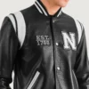 MensLiberteNewYorkBlackLeatherVarsityJacketCloseFront-5-1704186570399.webp